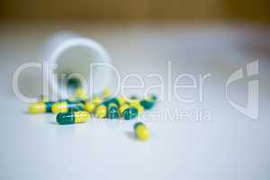 Capsules spilled on table