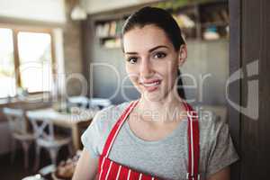 Portrait of female baker smiling