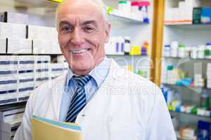 Pharmacist holding a file
