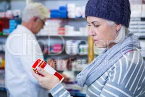 Customer checking a pill box