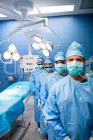 Portrait of surgeons standing in operation room