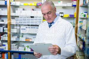 Pharmacist reading a prescription