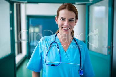 Portrait of surgeon standing in corridor Portrait of surgeon standing in corridor