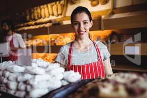 Portrait of female baker smiling