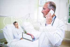 Doctor talking on mobile phone