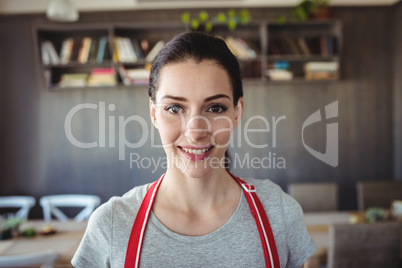 Portrait of female baker smiling