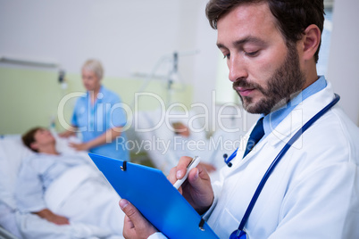 Doctor checking a medical report