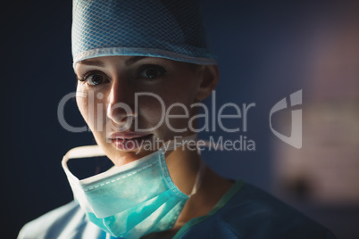 Portrait of smiling female surgeon in operation room