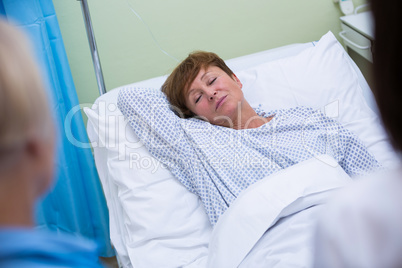 Senior patient lying on a bed