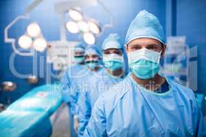 Portrait of surgeons standing in operation room