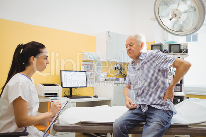 Female doctor interacting with a patient