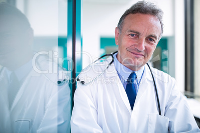 Portrait of doctor standing with arms crossed Portrait of doctor standing with arms crossed
