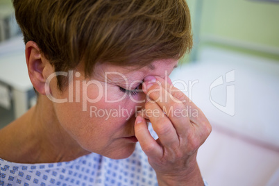 Close-up of tensed senior patient