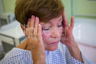 Close-up of tensed senior patient