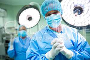 Surgeon praying in operation room while operation