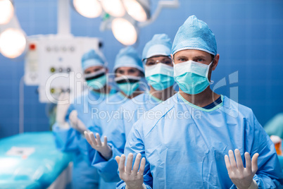 Portrait of surgeons standing in operation room