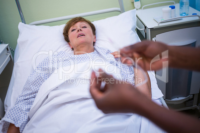 Nurse holding iv drip
