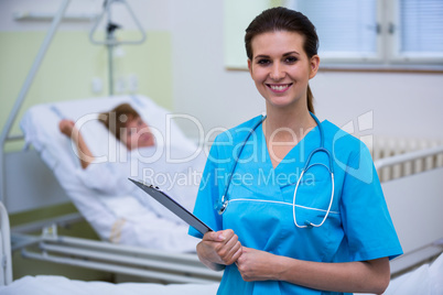 Nurse holding a clipboard