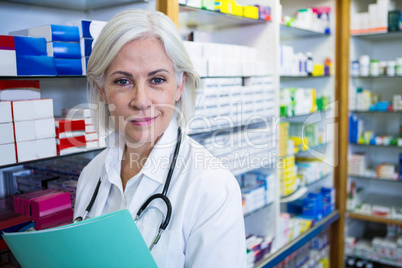 Pharmacist holding a file