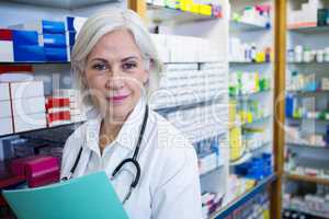 Pharmacist holding a file