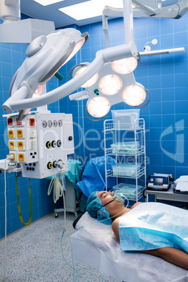 Patient lying on operation bed