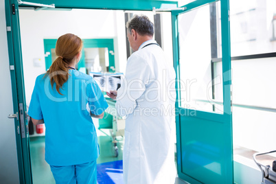 Doctor and nurses examining an x-ray