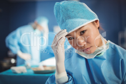 Portrait of female surgeon in operation room