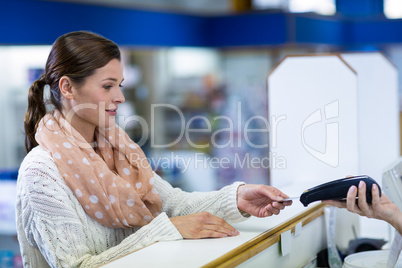 Customer making payment through payment terminal
