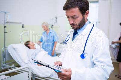 Doctor checking a medical report