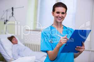 Nurse holding a medical report