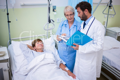 Doctor and nurse interacting with each other