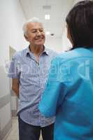 Female doctor interacting with patient