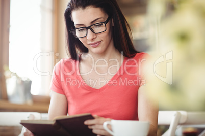 Beautiful woman reading a book