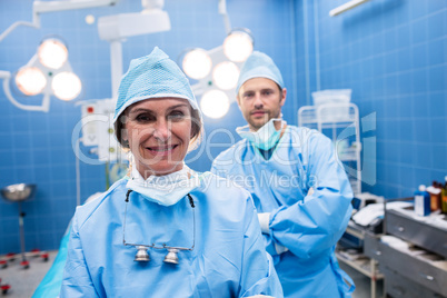 Portrait of surgeons standing in operation room