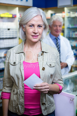 Customer holding a prescription