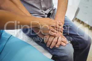 Close-up of female doctor consoling a patient