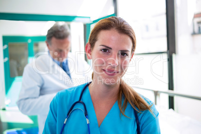 Portrait of doctor and nurse smiling at camera