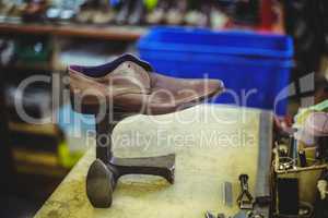 Leather shoe on shoe repair stand