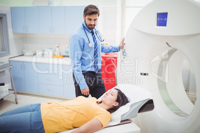 A patient is loaded into an mri machine