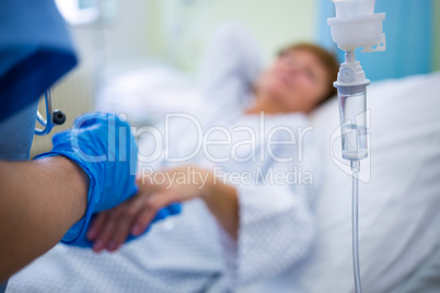 Nurse giving an injection to a patient