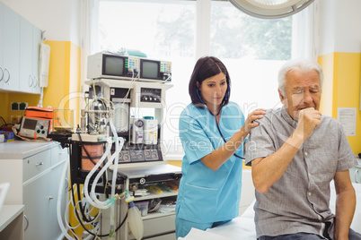 Female doctor examining a patient