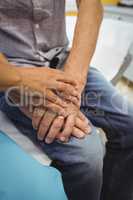 Close-up of female doctor consoling a patient