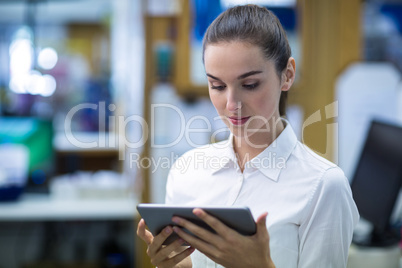 Pharmacist using digital tablet