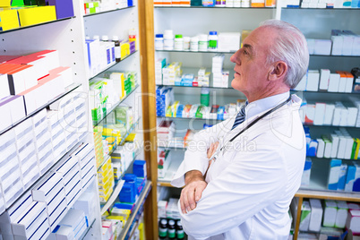 Pharmacist checking medicines in pharmacy