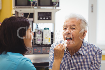 Doctor examining a patient