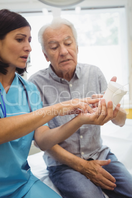 Doctor explaining medicine to his patient