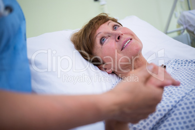 Senior patient talking to a nurse