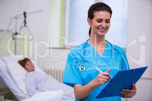 Nurse checking a medical report
