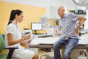 Female doctor interacting with a patient