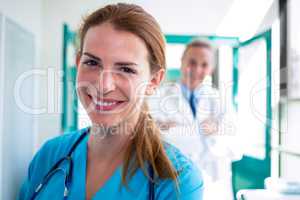 Portrait of doctor and nurse smiling at camera